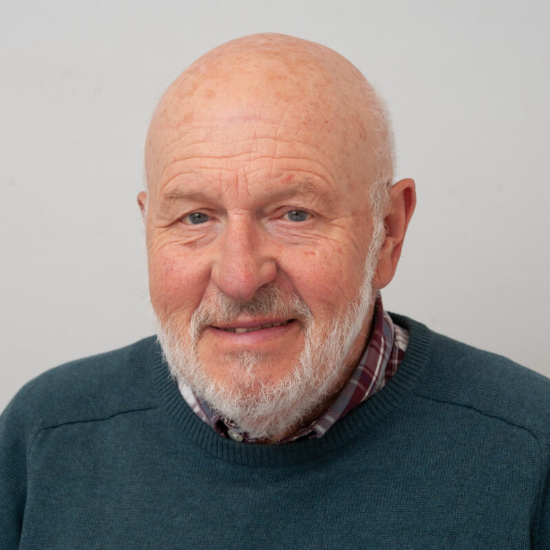 White man with a grey beard and moustache