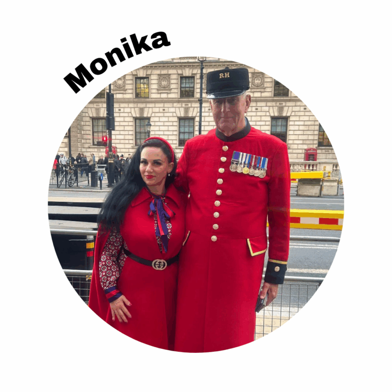 Image of Monika standing with someone in a red uniform. Her name is above the photo in a round frame