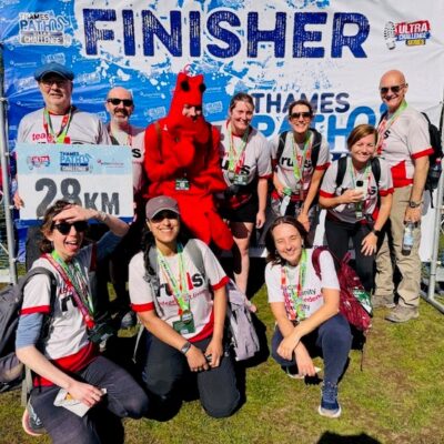A group of challengers finish the Thames Path Challenge