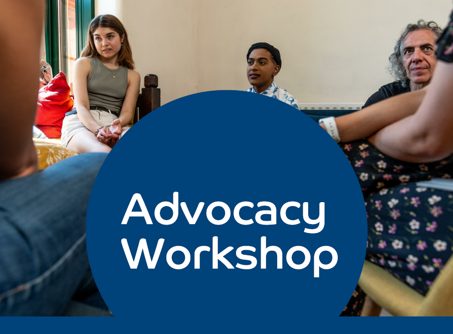 Image of a group of people in a relaxed meeting setting. There is a big circle in the middle of the photo that reads 'Advocacy Workshop'. The circle is blue with white text.