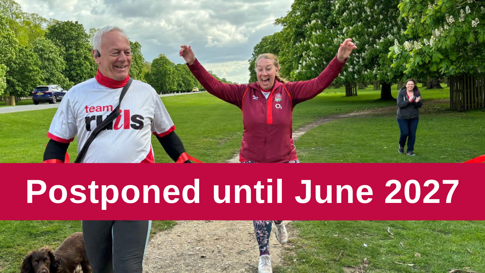 Image of two people running towards a finish line in a park with their hands held in the air - text reads 'postponed until June 2027'